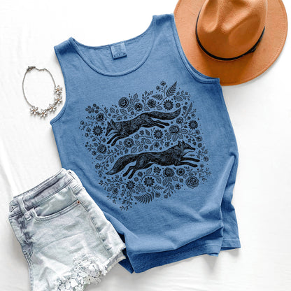 Blue tank top with wolf design, shorts, hat, and necklace on a white background