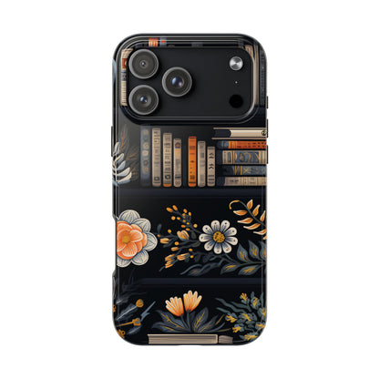 Phone case with floral and book design on a black background