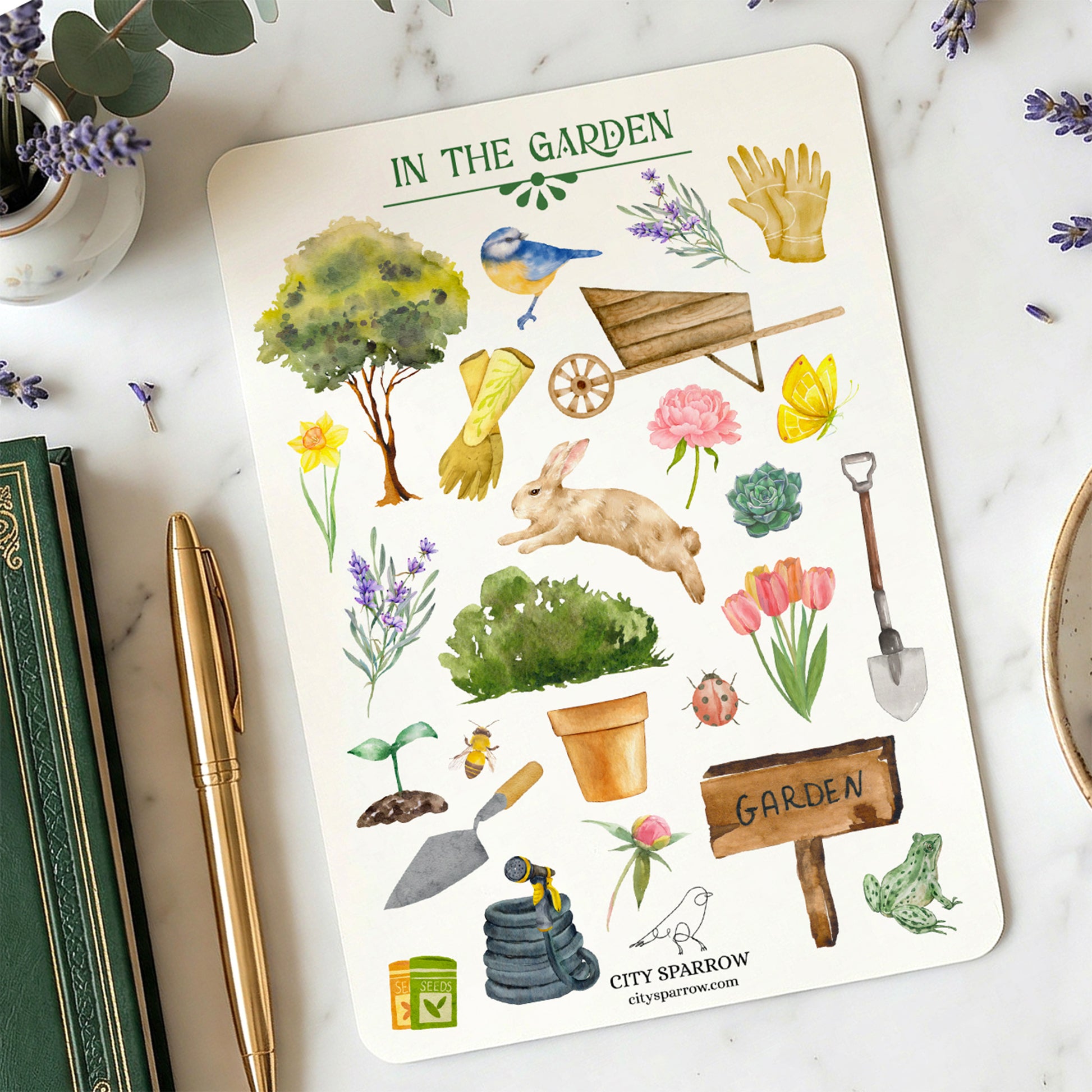 Sticker sheet with garden-themed illustrations on a marble surface with gardening tools and plants.
