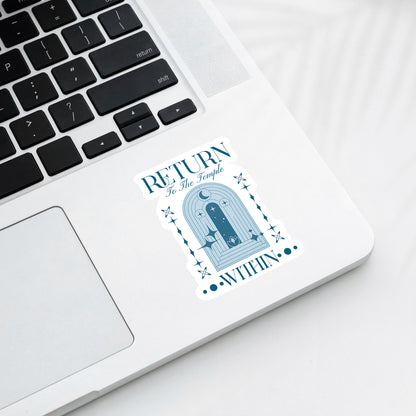 Laptop with a sticker on the palm rest area featuring text and a temple design.