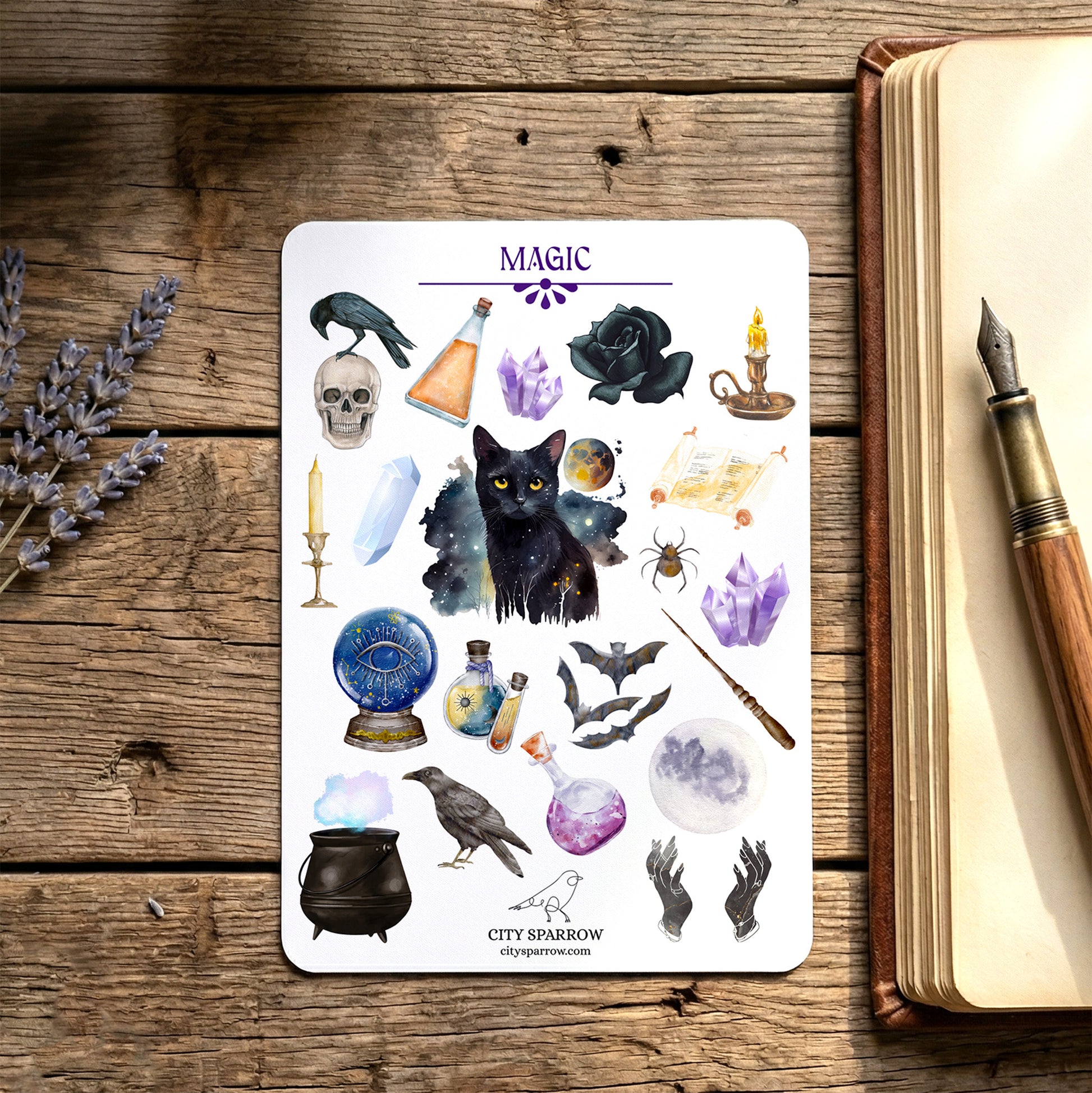 Sheet of mystical stickers with various symbols on a wooden surface with a book and pen.