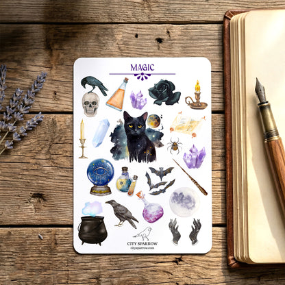 Sheet of mystical stickers with various symbols on a wooden surface with a book and pen.