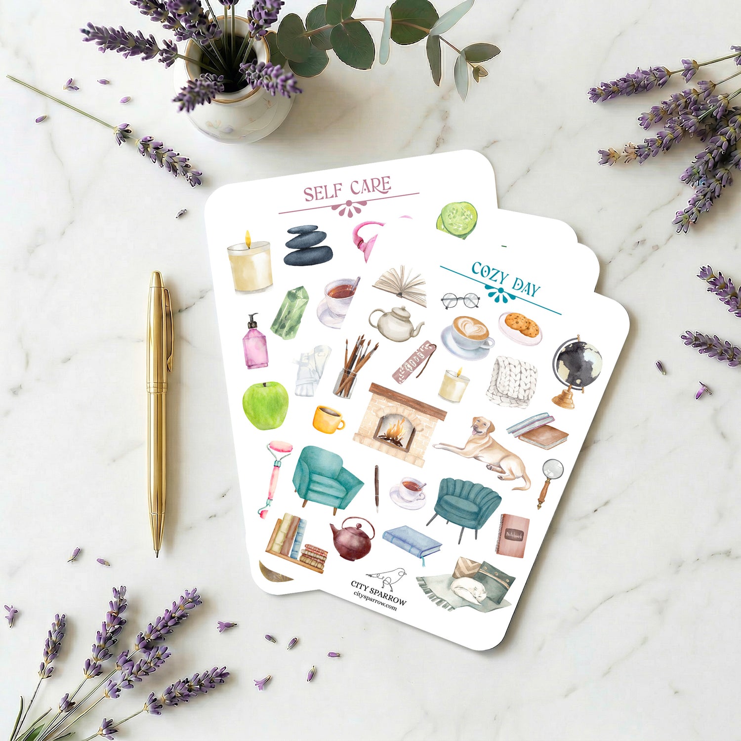 Sticker sheets with self-care and cozy day illustrations on a marble surface with lavender flowers.
